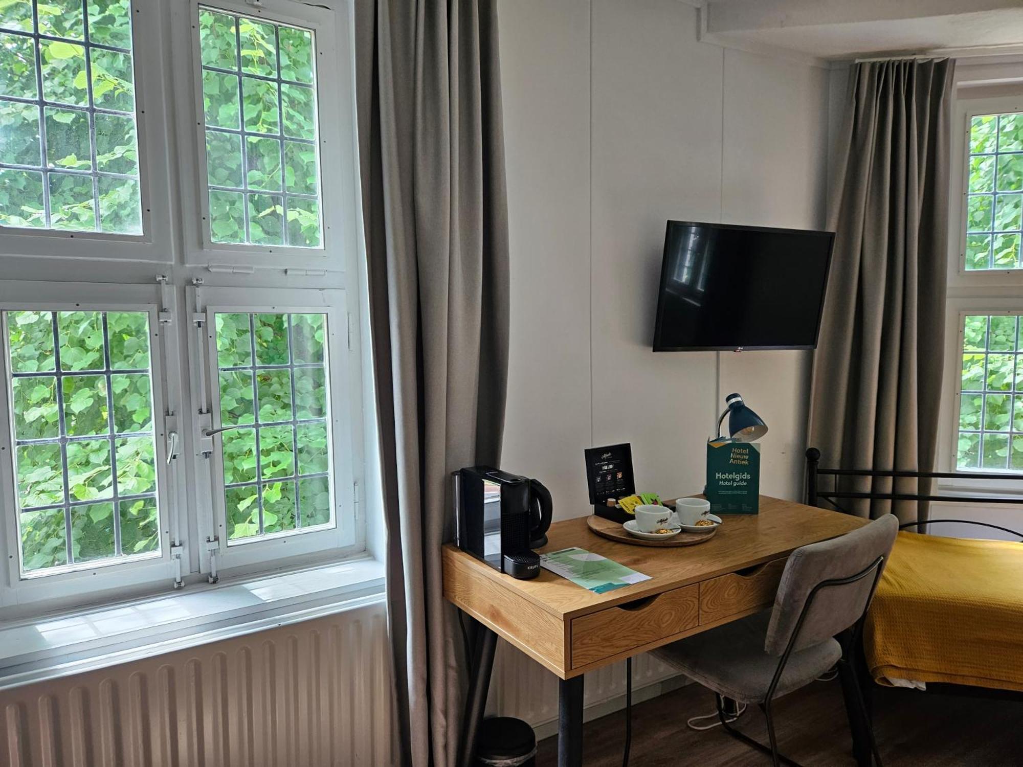Hotel Nieuw Antiek Helden Cameră foto